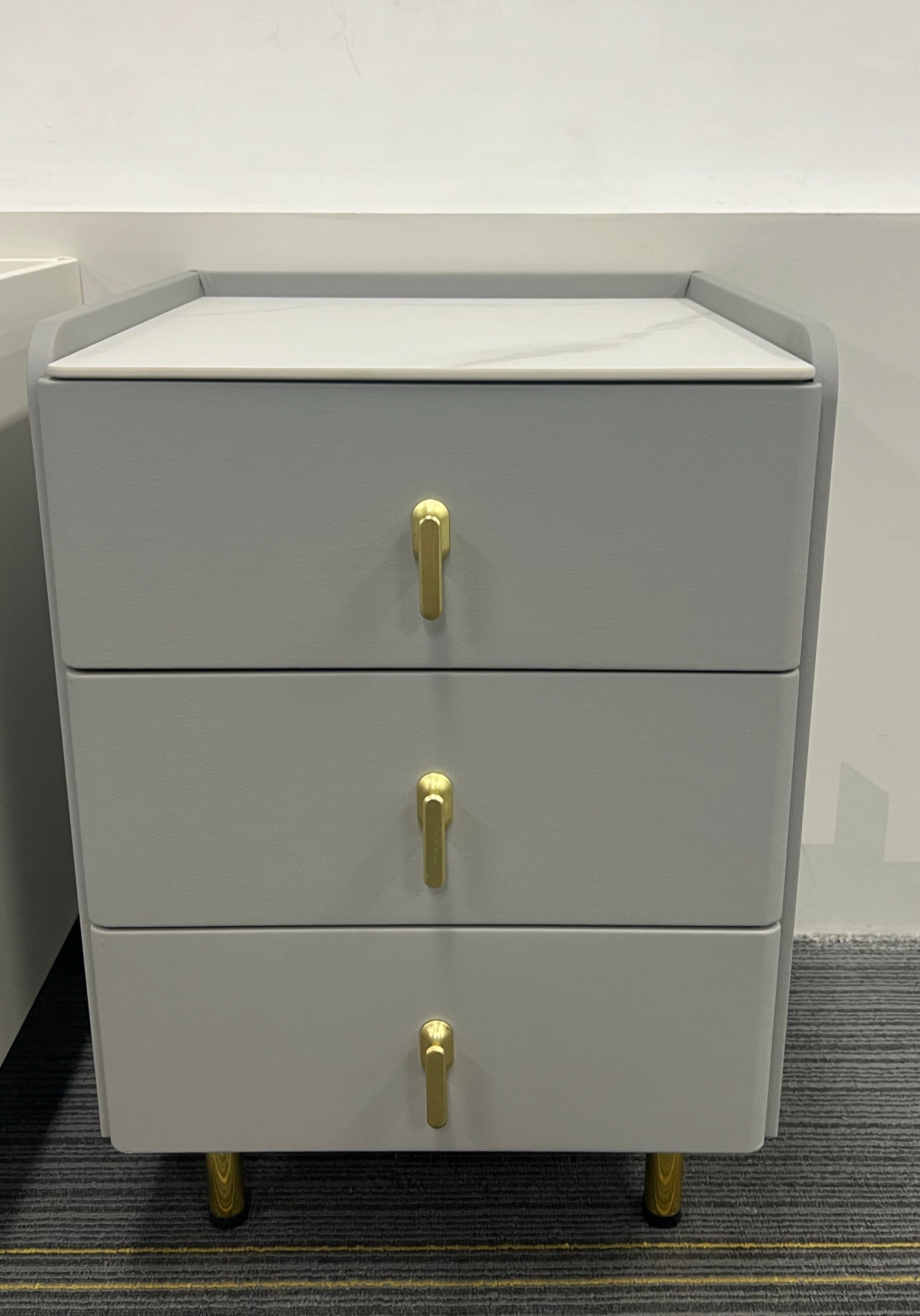 Elevate your home with our elegant beige three-tier sideboard. Crafted from high-density particleboard with a scratch-resistant finish, this piece is built to last. The warm, neutral tone complements any decor.